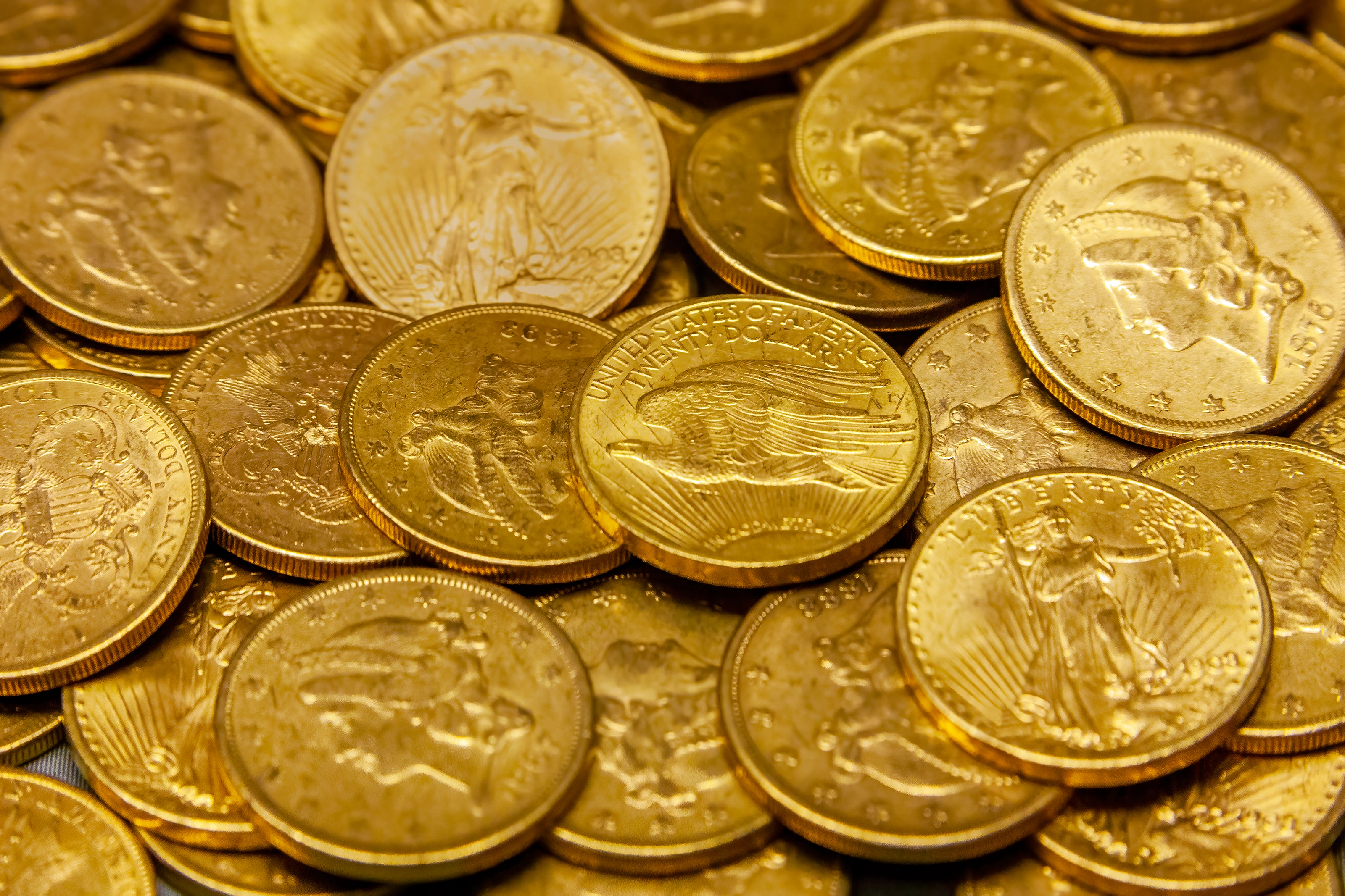 Gold coins including American Eagles and pre-1933 US gold