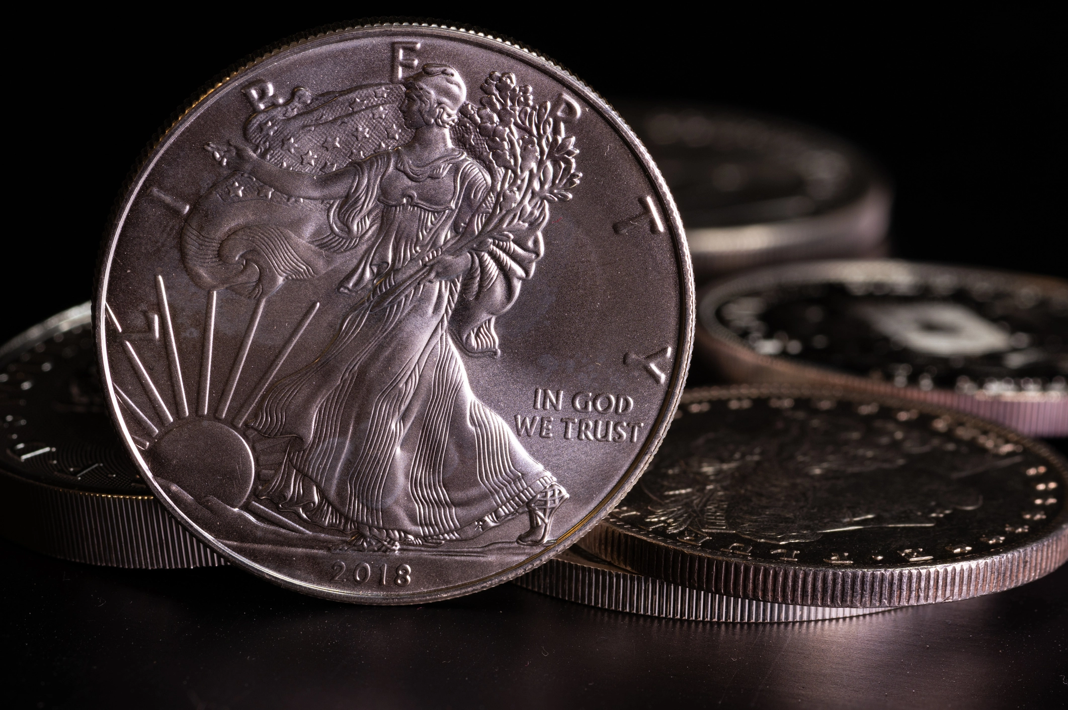 Silver coins including Morgan dollars and pre-1964 US silver